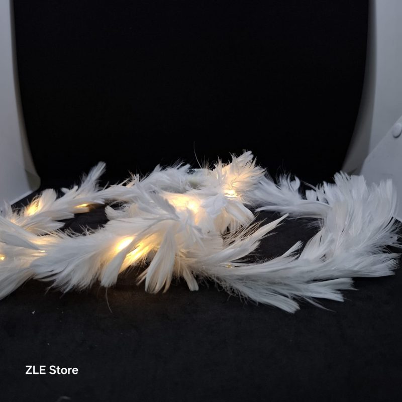 CORONA PLUMAS CON LUZ X10U
