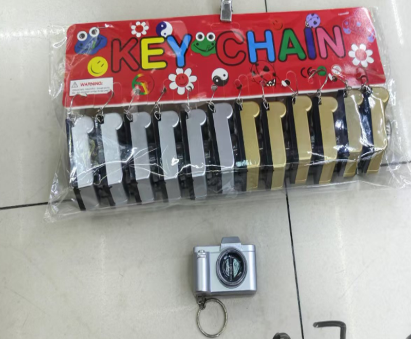 LLAVERO DE LINTERNA CAMARA METALIZADA CON LUZ X12U
