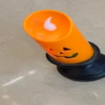 [PREZLCHA0701] Vela craneo naranja con luz x12 Estándar